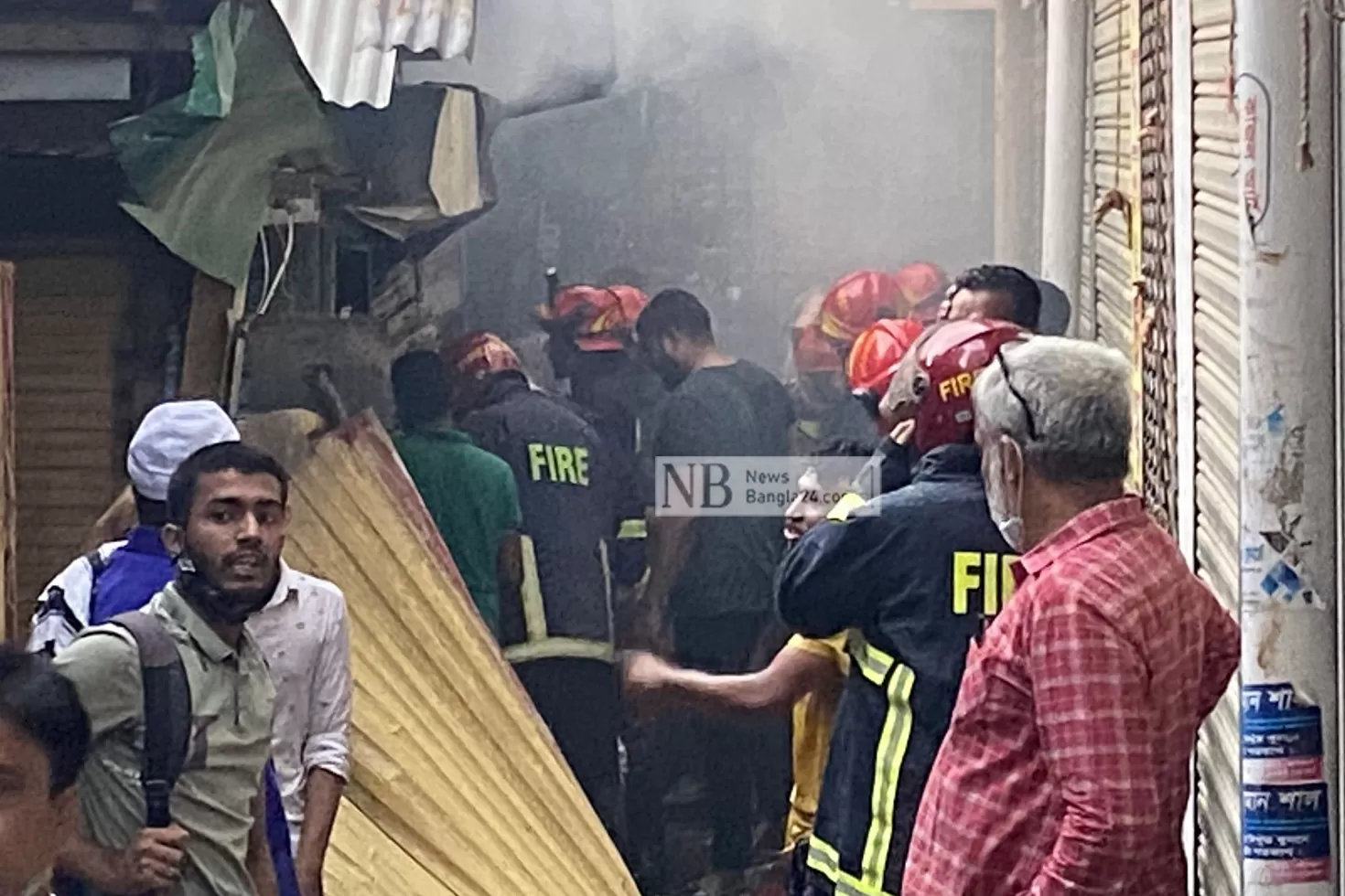 আগুনে পুড়ছে বাবুরহাট বাজার