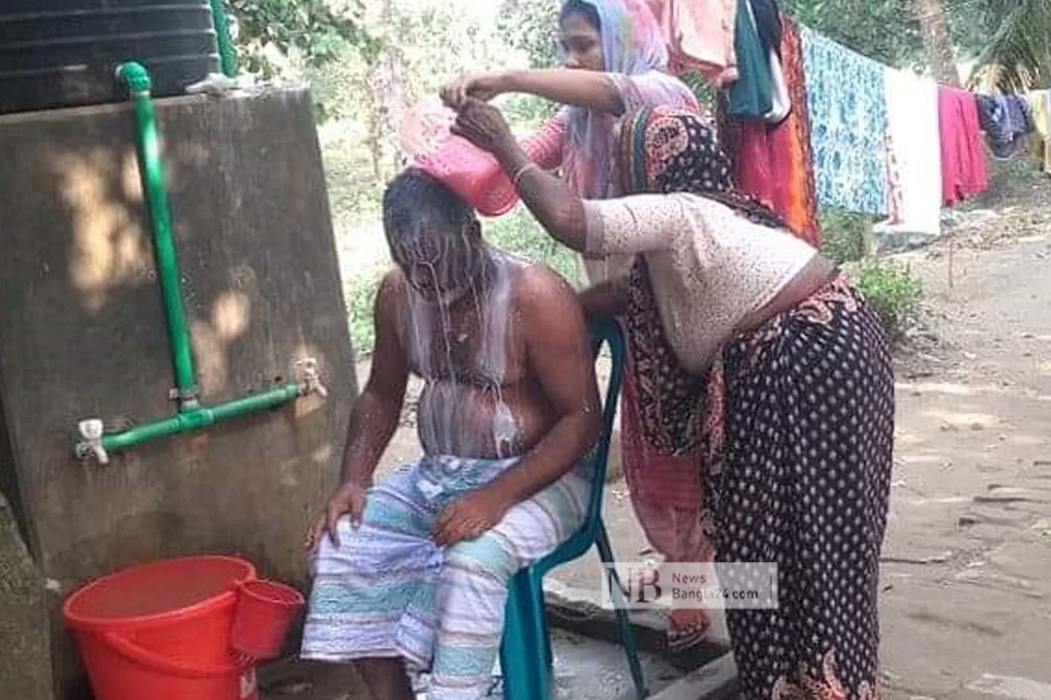 ‘মানতের দুধে’ নবনির্বাচিত চেয়ারম্যানের গোসল 