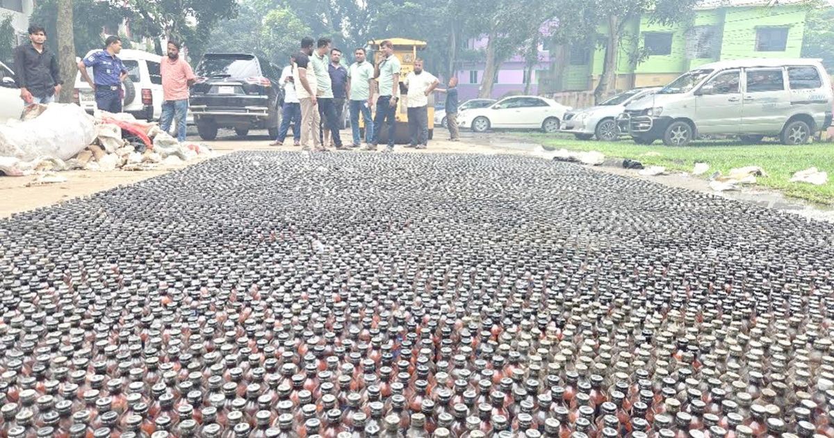 16-thousand-61-bottles-of-seized-Phencidil-were-crushed-in-Naogaon